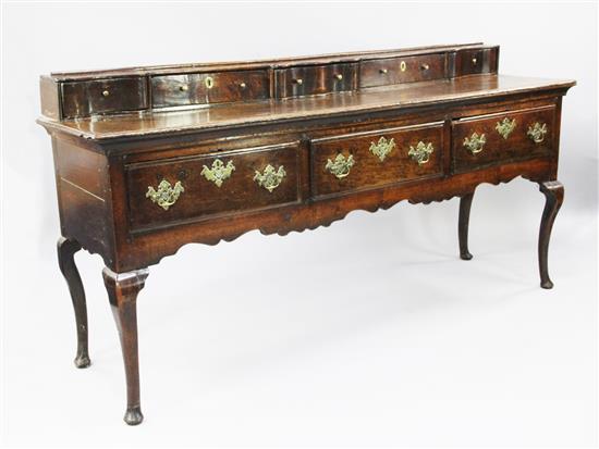 A George III oak dresser base, W.6ft 5in.